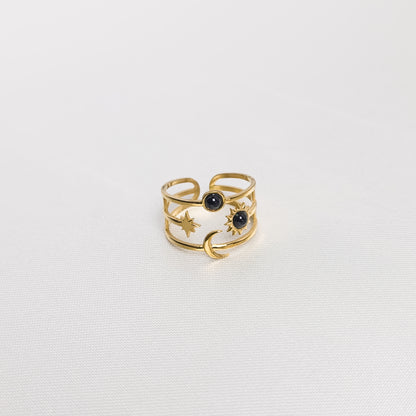  Bague Davina noire, en acier inoxydable doré et argenté, disponible à Paris.