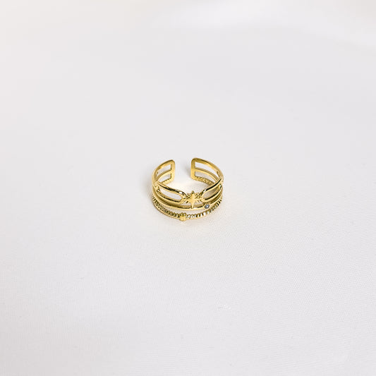 Bague Gaïa, en acier inoxydable doré, disponible à Paris.