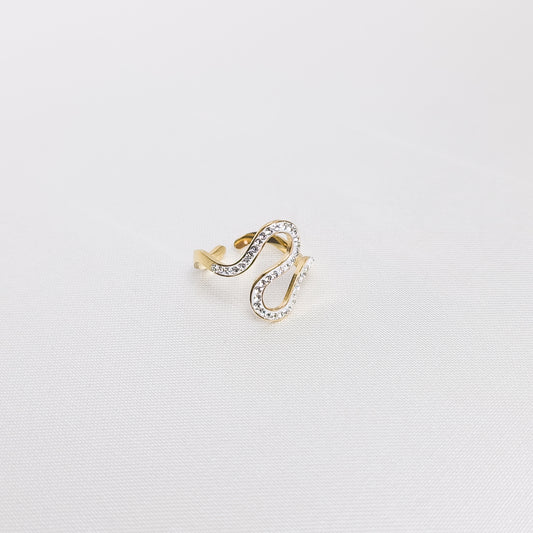 Bague Iris, en acier inoxydable doré, disponible à Paris.